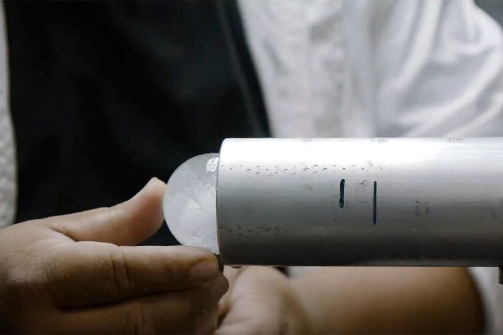 The “hail cannon” is loaded with an ice ball that will be fired at a solar panel. Credit: RETC