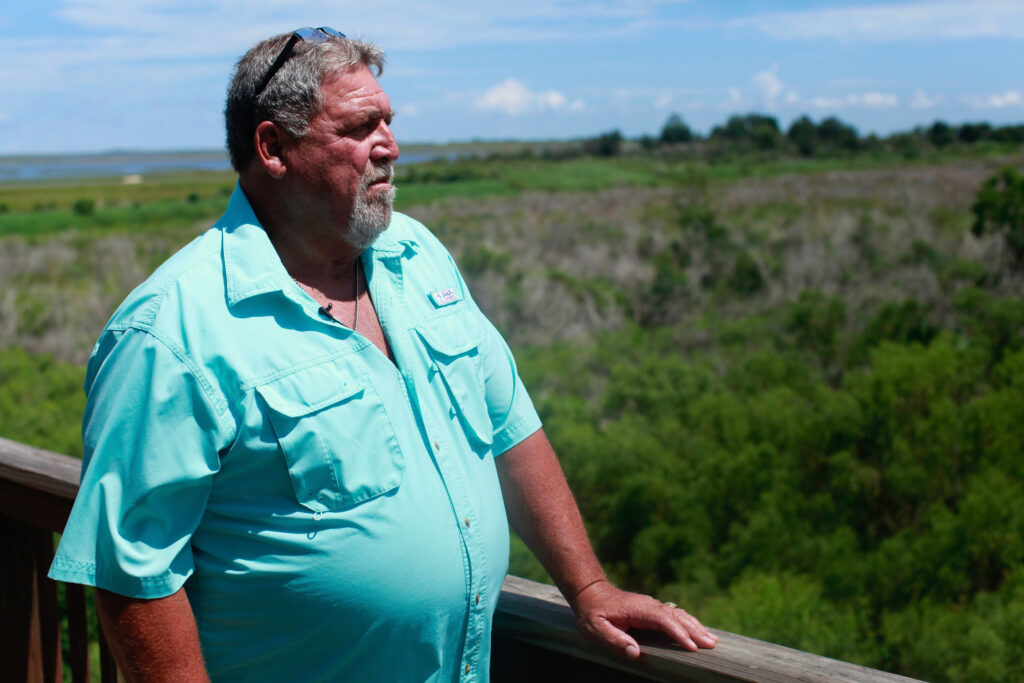 Chief Deme Naquin, leader of the Jean Charles Choctaw Nation, visits his family’s former home on Isle de Jean Charles, La. Naquin and other tribal leaders have been highly critical of the relocation project that moved residents 40 miles north. “This is supposed to be a model. Not just for us. For the rest of the country, maybe the world. So why did it fail?” Credit: Evan Simon/Floodlight