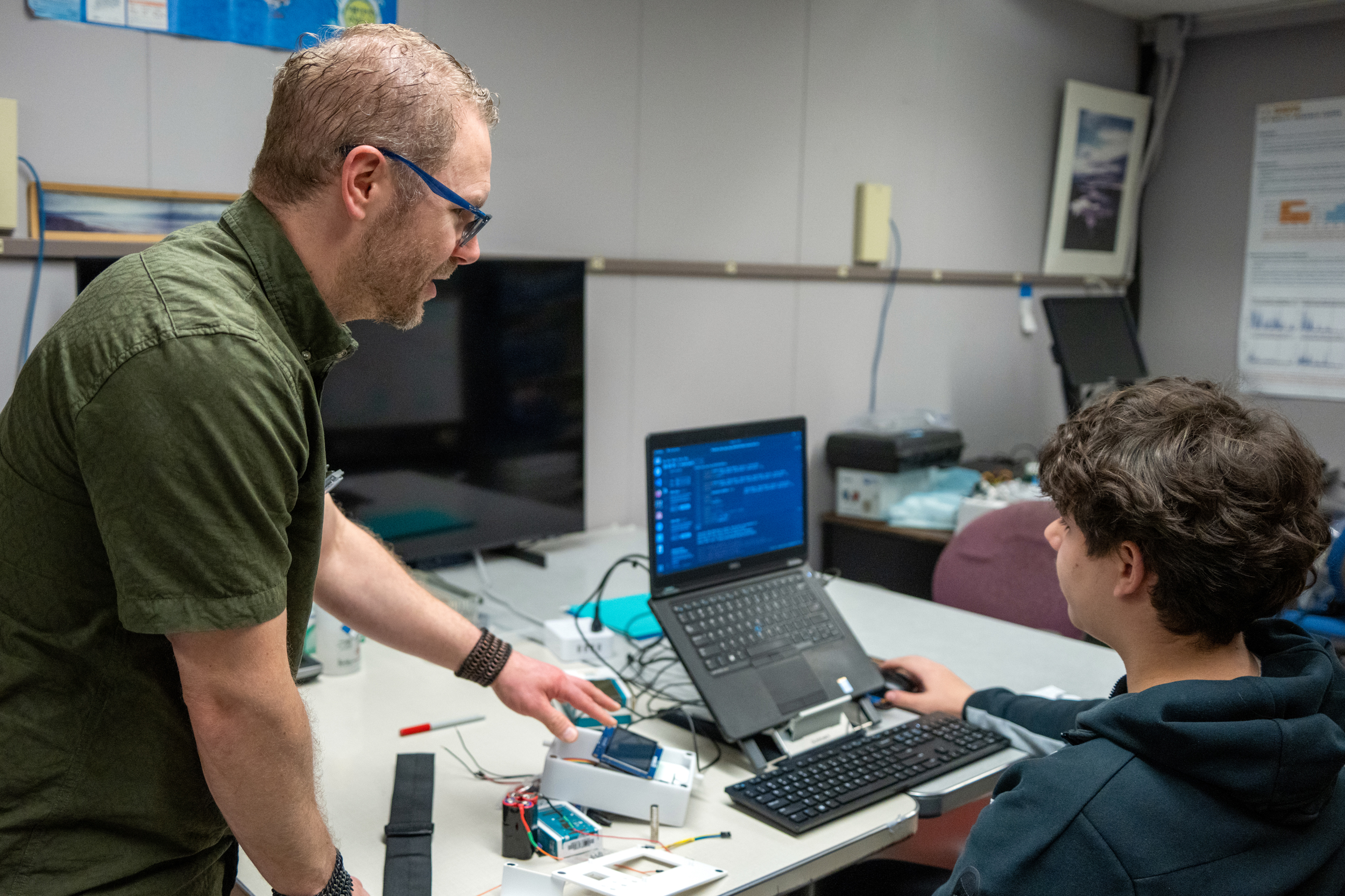Nicholas Spada speaks with an undergraduate student at UC Davis’ Crocker Nuclear Lab.