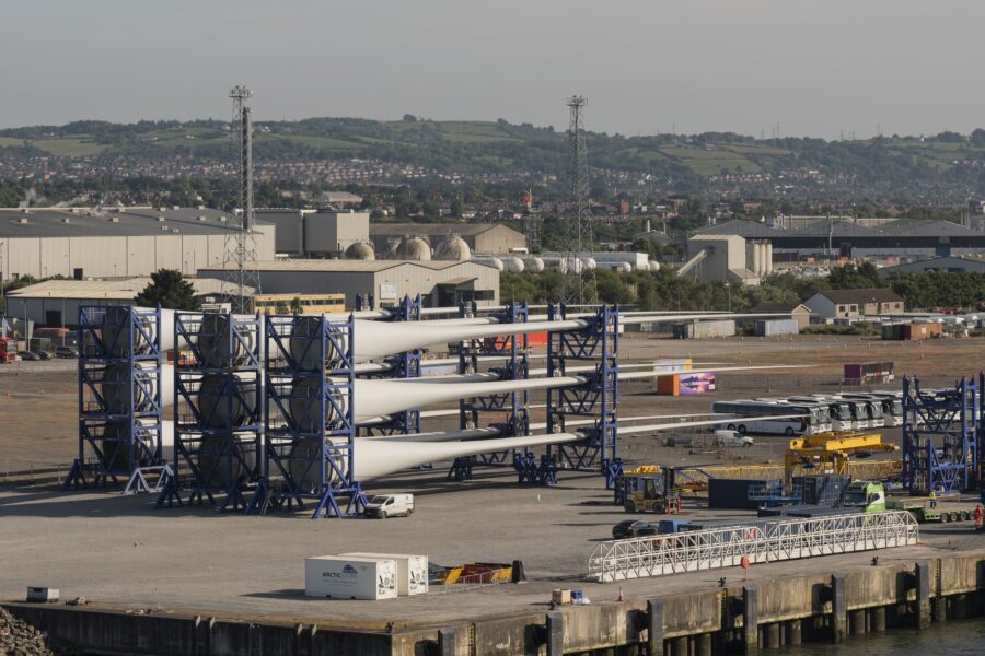 At Climate Week NYC, an official said the United Kingdom would expand offshore wind as part of its national climate action plan. Here, in Belfast, Norther Ireland, wind turbine blades are assembled in Belfast Harbor. Credit: Peter Titmuss/UCG/ Universal Images Group via Getty Images