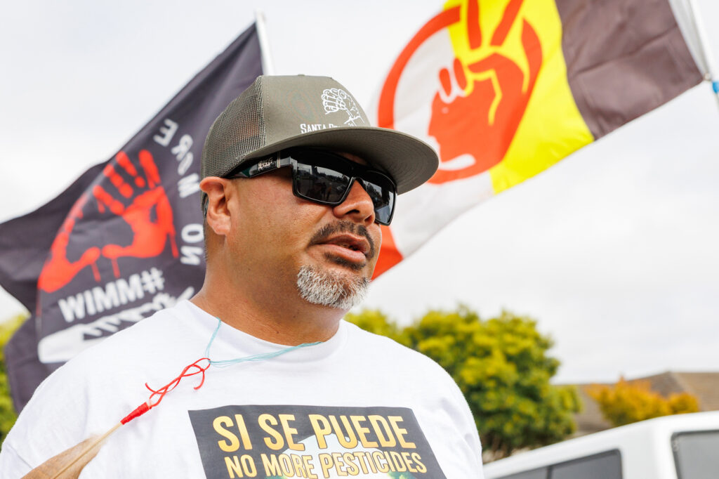 Activist Omar Dieguz started a hunger strike on September 1 to protest the heavy use of pesticides near schools, homes and other sites in Latino communities. He spoke at a rally in Salinas, Calif., where he called on the region’s major agricultural companies, including Driscoll’s, to convert to organic farming to protect local residents and future generations. Credit: Kevin Painchaud/Lookout Santa Cruz