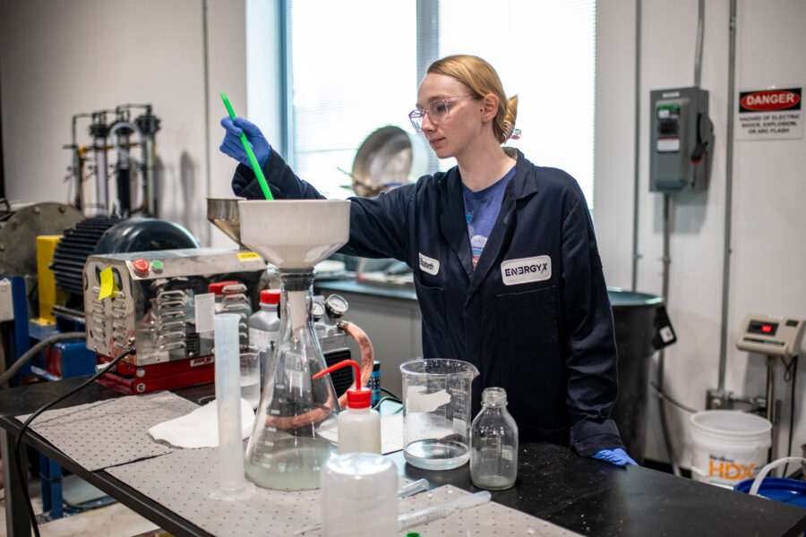 An employee with EnergyX, an Austin-based lithium startup, works in the company’s laboratory on Oct. 7. Credit: Sergio Flores/The Texas Tribune