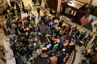 Lobby Day participants gather in the state capitol rotunda for the “People over Polluters” rally in the Illinois Capitol Building rotunda on Wednesday. Credit: Andrew Montequin/Inside Climate News