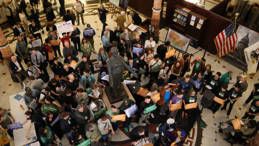 Lobby Day participants gather in the state capitol rotunda for the “People over Polluters” rally in the Illinois Capitol Building rotunda on Wednesday. Credit: Andrew Montequin/Inside Climate News