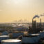 In Houston, the LyondellBasell refinery, with the Houston skyline in the background. Credit: Brandon Bell/Getty Images