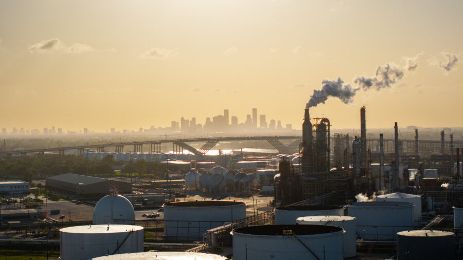 In Houston, the LyondellBasell refinery, with the Houston skyline in the background. Credit: Brandon Bell/Getty Images