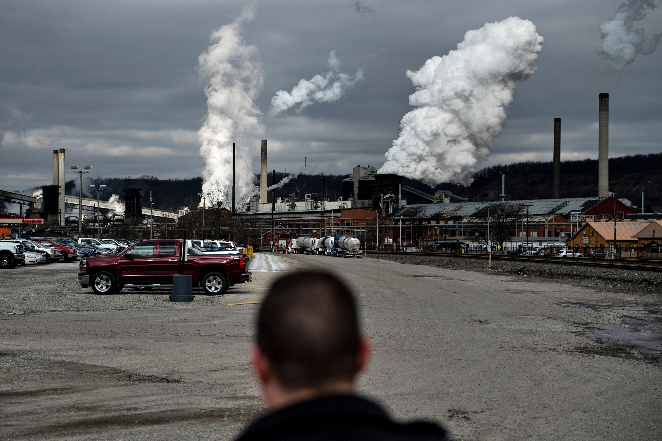 White plumes of smoke billow above U.S. Steel’s Clairton Coke Works in Clairton, Pa. Credit: Brendan Smialowski/AFP via Getty Images