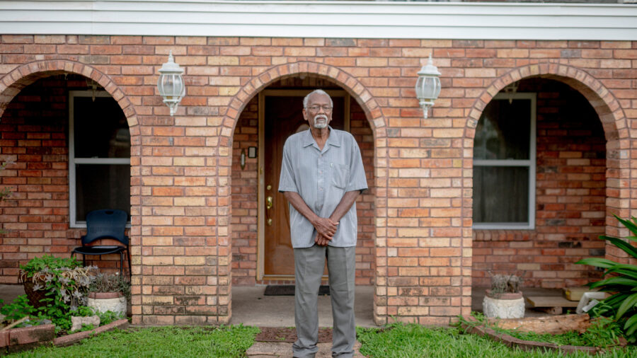Robert Taylor, co-founder of Concerned Citizens of St. John, stands in front of his home in Reserve, La. Credit: Emily Kask/AFP via Getty Images