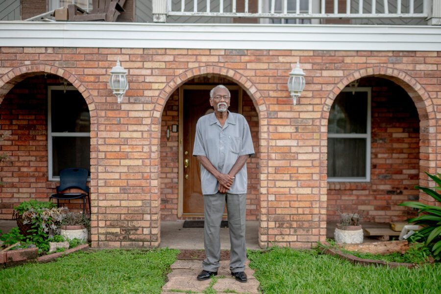 Robert Taylor, co-founder of Concerned Citizens of St. John, stands in front of his home in Reserve, La. Credit: Emily Kask/AFP via Getty Images