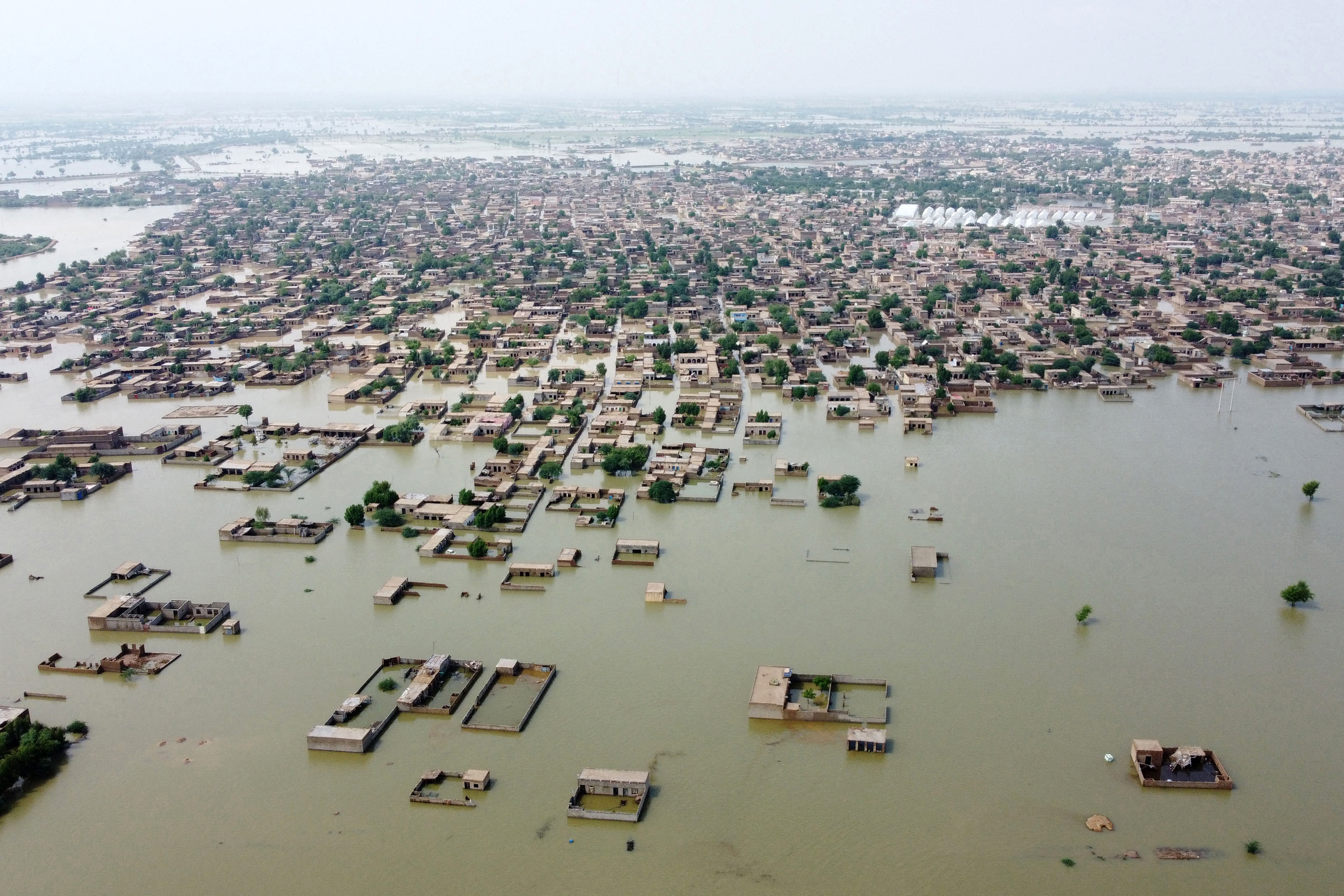 An aerial view of a flooded residential area in the Jaffarabad district of Pakistan’s Balochistan province on Aug. 30, 2022. Credit: Fida Hussain/AFP via Getty Images