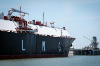 A liquefied natural gas carrier ship sits docked in the Calcasieu River near Cameron, La. Credit: Jon Shapley/Houston Chronicle via Getty Images