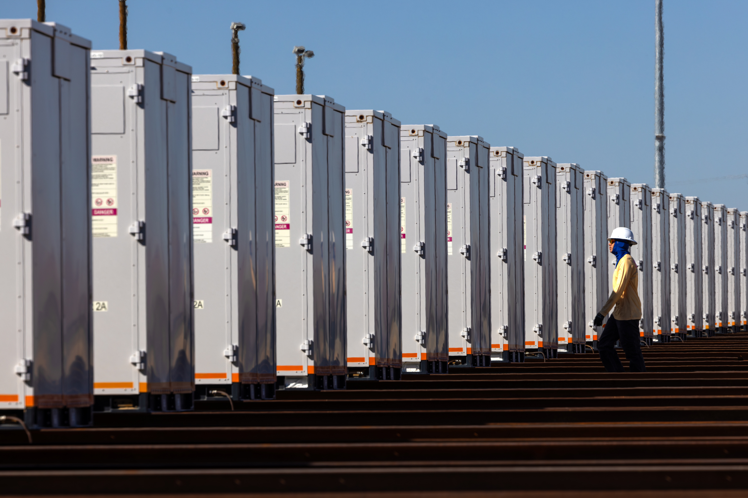 Battery energy storage system is seen adjacent to a solar farm in Daggett, Calif. Credit: Irfan Khan/Los Angeles Times via Getty Images