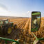 A combine harvests corn alongside a tractor near Northland, Minn. Credit: Richard Hamilton Smith/Universal Images Group via Getty Images