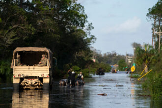 National Guard soldiers search for people stranded by flooding in the aftermath of Hurricane Helene on Sept. 27, 2024, in Steinhatchee, Fla. Credit: Sean Rayford/Getty Images