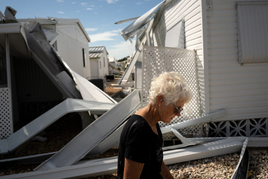 Linda Kling in front of her damaged mobile home in the wake of Hurricane Milton on Oct. 10, 2024, in Bradenton, Fla. Credit: Thomas Simonetti for The Washington Post via Getty Images