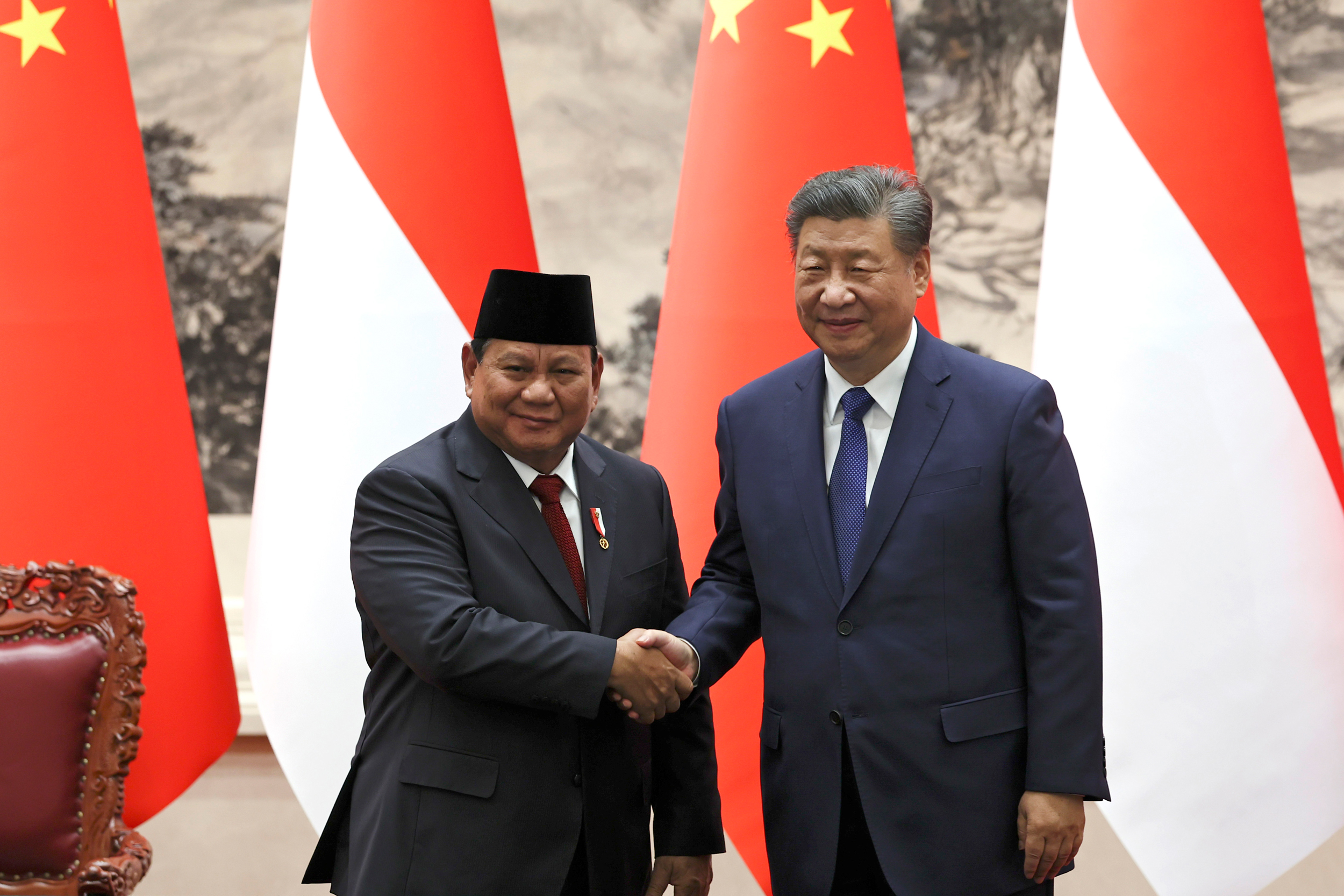 Chinese President Xi Jinping (right) and Indonesian President Prabowo Subianto shake hands during a ceremony at the Great Hall of the People on Nov. 9, 2024, in Beijing, China. Credit: Florence Lo/Pool via Getty Images