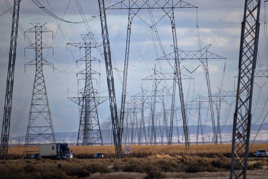 High-voltage transmission lines run along Interstate 5 in the central California community of Buttonwillow. Credit: Jay L. Clendenin/Getty Images
