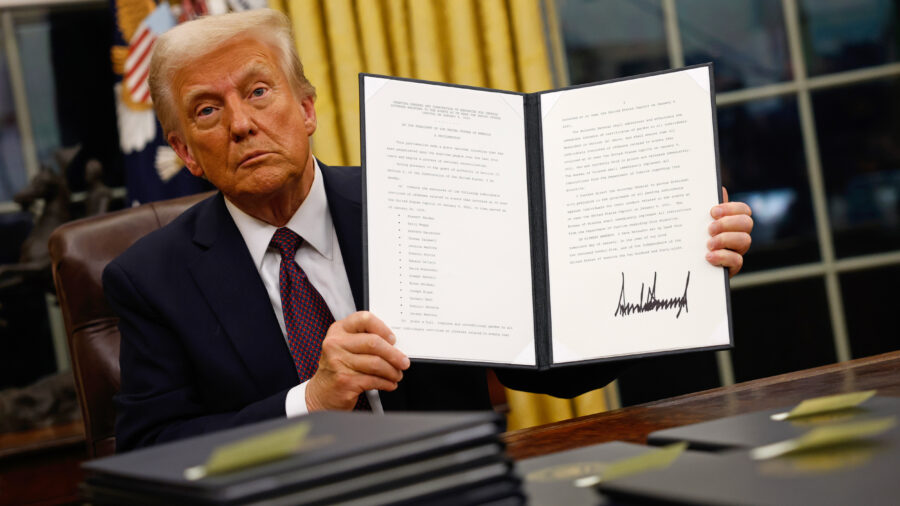 President Donald Trump signs a series of executive orders at the White House on Jan. 20 in Washington, D.C. Credit: Anna Moneymaker/Getty Images
