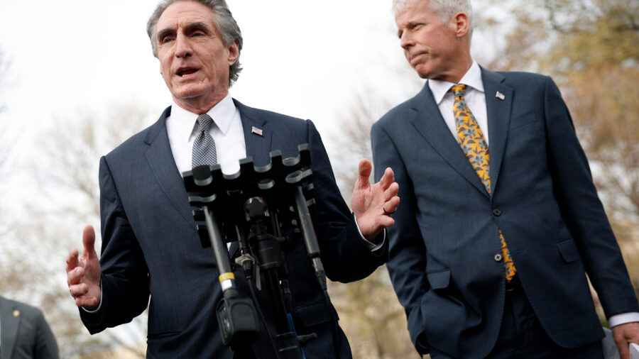 Interior Secretary Doug Burgum (left) and Energy Secretary Chris Wright deliver remarks outside the White House on March 19 in Washington, D.C. Credit: Kevin Dietsch/Getty Images