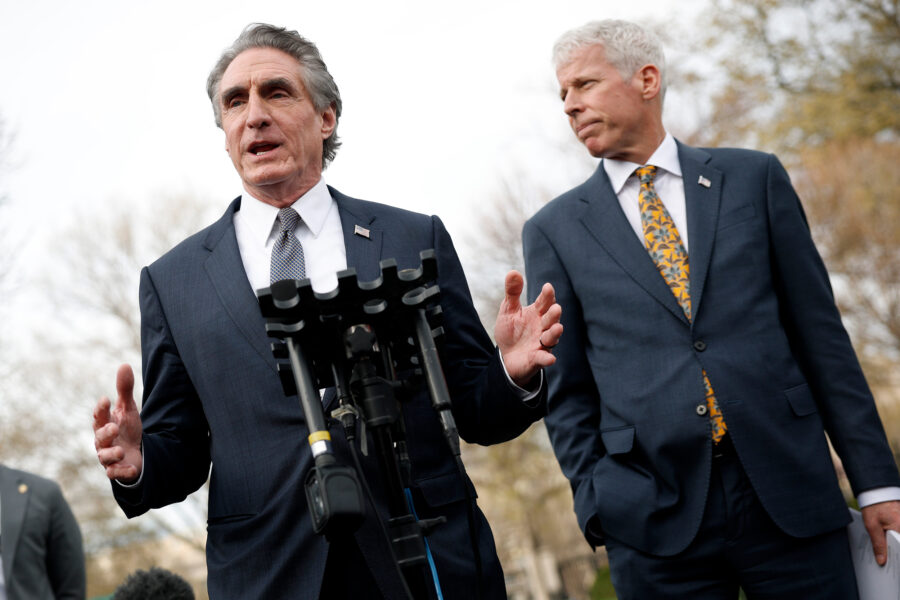 Interior Secretary Doug Burgum (left) and Energy Secretary Chris Wright deliver remarks outside the White House on March 19 in Washington, D.C. Credit: Kevin Dietsch/Getty Images