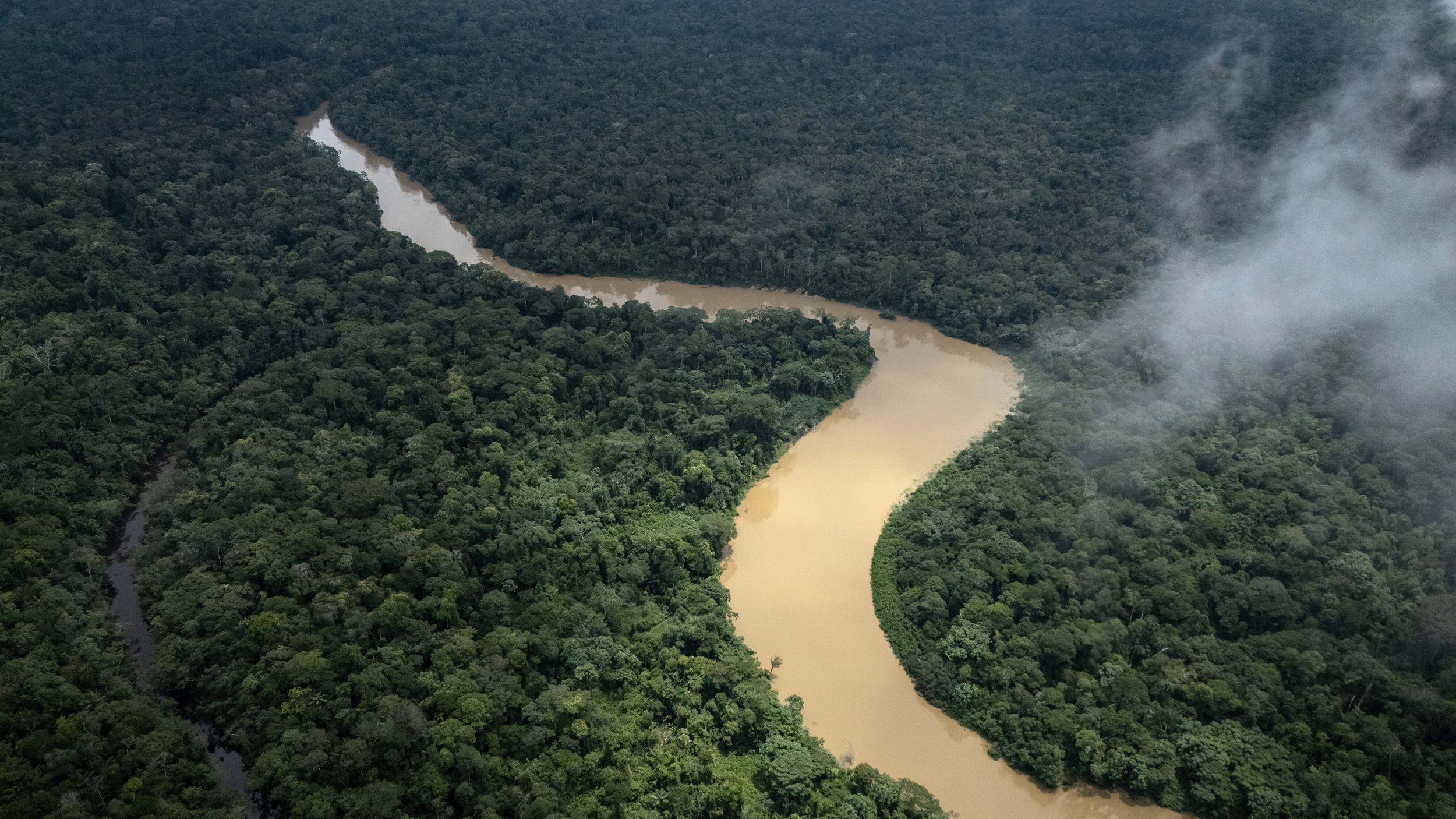 The Shiripuno and Cononaco rivers flow through a remote Indigenous settlement in the Amazon Region of Ecuador. Credit: Ozge Elif Kizil/Anadolu via Getty Images