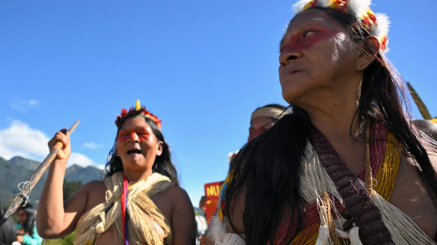 Waorani Indigenous people march in Quito, Ecuador, against new oil fields in the Amazon region on May 13. Credit: Rodrigo Buendia/AFP via Getty Images