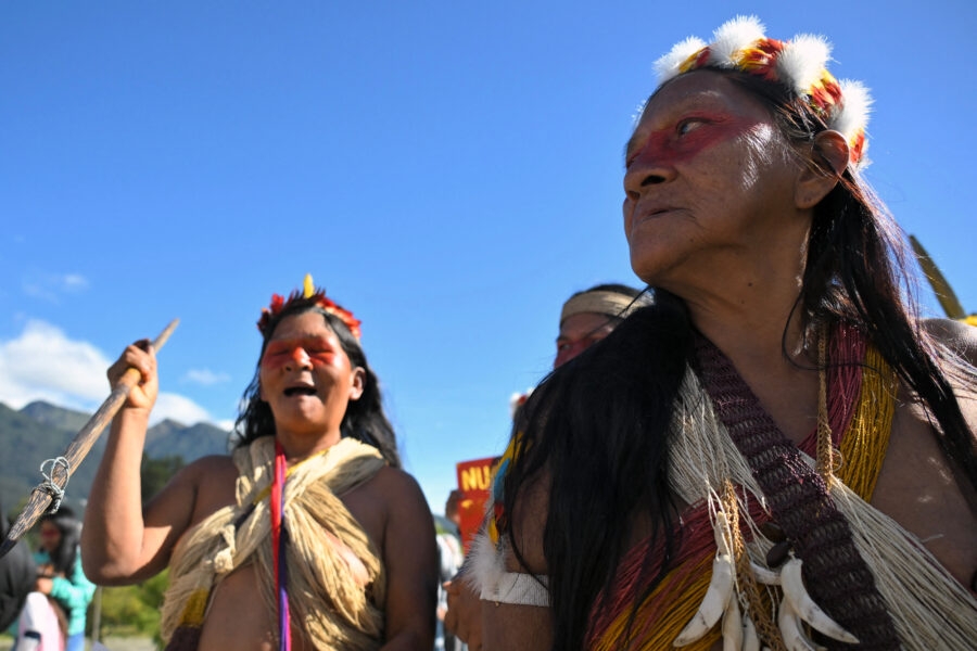 Waorani Indigenous people march in Quito, Ecuador, against new oil fields in the Amazon region on May 13. Credit: Rodrigo Buendia/AFP via Getty Images