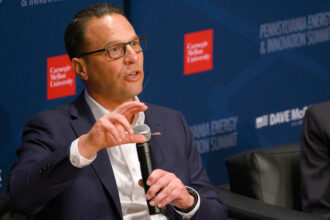 Gov. Josh Shapiro speaks at the Pennsylvania Energy and Innovation Summit at Carnegie Mellon University on July 15 in Pittsburgh. Credit: Jeff Swensen/Getty Images