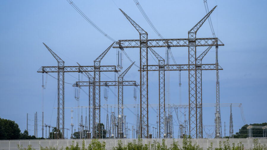 Transmission lines feed into a substation near a data center construction site on July 24 in Lewis Center, Ohio. Credit: Eli Hiller/The Washington Post via Getty Images