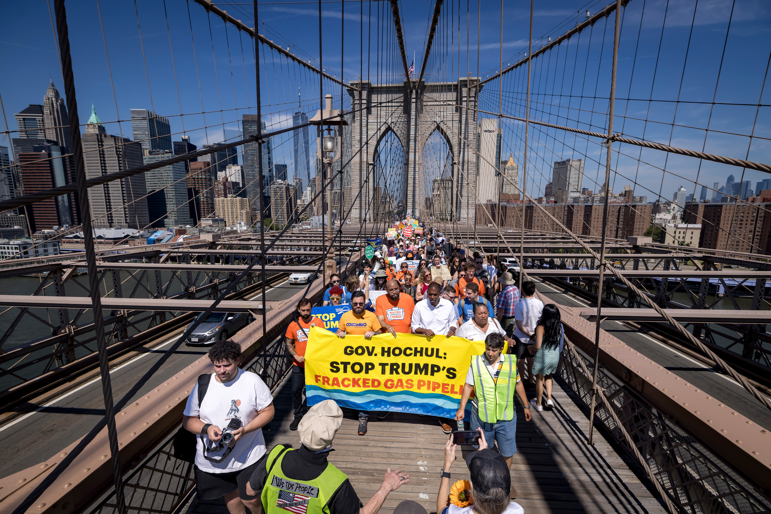 Climate activists march across the Brooklyn Bridge to demand that New York Governor Kathy Hochul stop the construction of the Williams Pipeline. Credit: Michael Nigro/Pacific Press/LightRocket via Getty Images