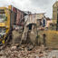 People salvage belongings from the rubble of their home on Wednesday after it collapsed during Hurricane Melissa’s passage through Santiago de Cuba. Credit: Yamil Lage/AFP via Getty Images