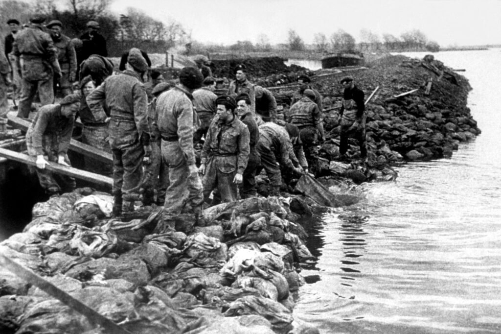 English soldiers clear up damage caused by flooding in the fens of eastern England on May 3, 1947. Credit: Charles Hewitt/Picture Post/Hulton Archive/Getty Images