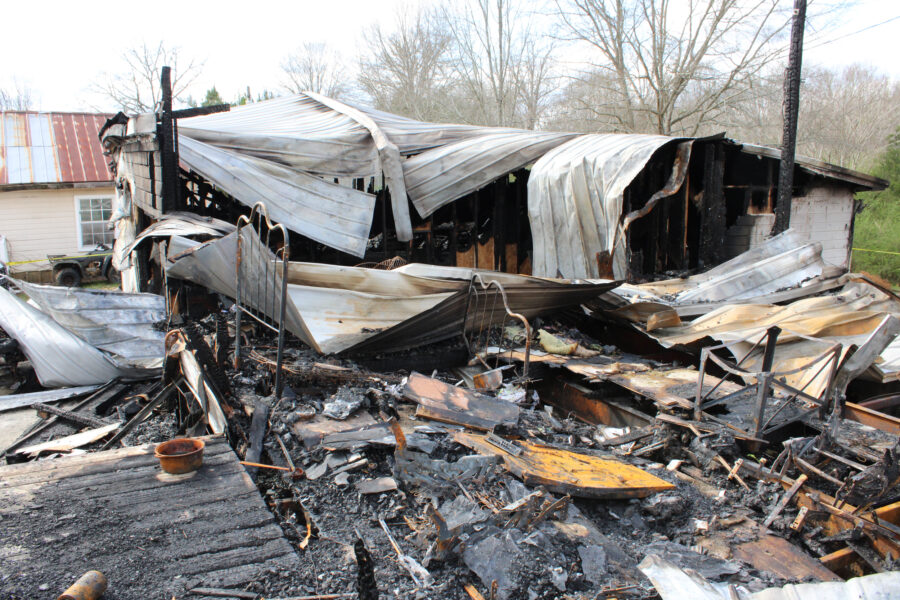 The remnants of a fatal home explosion above the Oak Grove mine in March 2024. Credit: Courtesy of the Alabama Fire Marshal’s Office