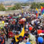 People attend the funeral of Efraín Fueres. Fueres, 46, was gunned down last month in Cotacachi, Ecuador, where he was marching in protest of high costs of living and government crackdowns on Indigenous and environmental activists. Credit: La Raíz