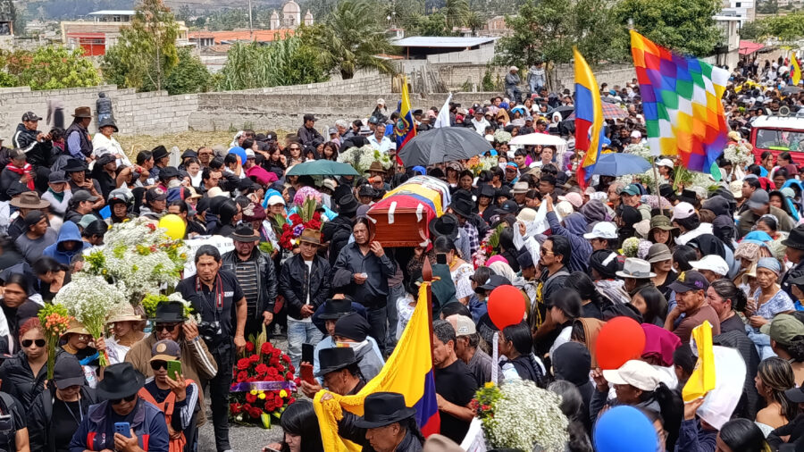 People attend the funeral of Efraín Fueres. Fueres, 46, was gunned down last month in Cotacachi, Ecuador, where he was marching in protest of high costs of living and government crackdowns on Indigenous and environmental activists. Credit: La Raíz