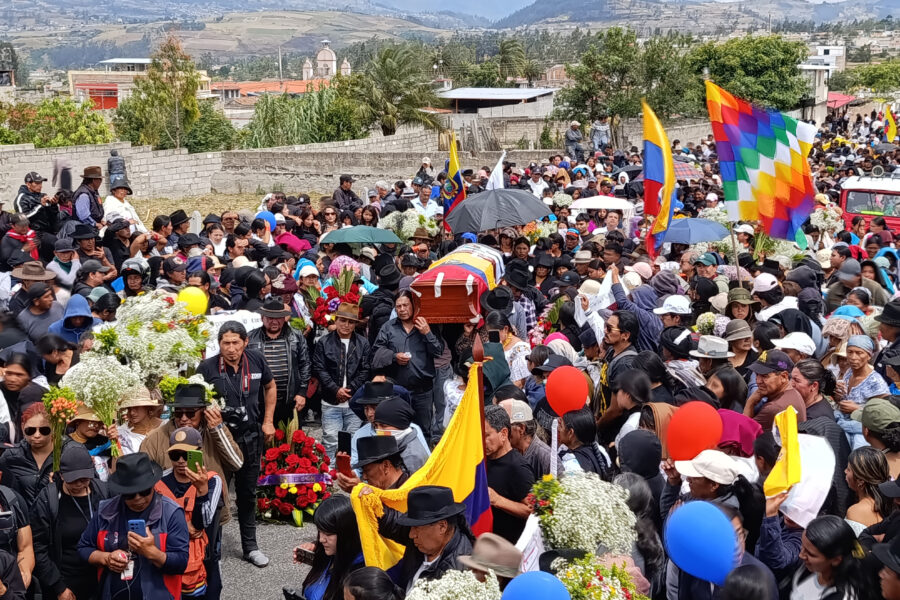 People attend the funeral of Efraín Fueres. Fueres, 46, was gunned down last month in Cotacachi, Ecuador, where he was marching in protest of high costs of living and government crackdowns on Indigenous and environmental activists. Credit: La Raíz