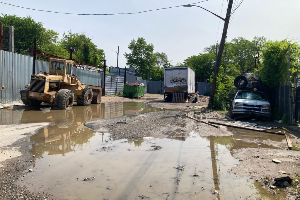 Likely abandoned vehicles are seen in the Jewel Streets. Credit: Lauren Dalban/Inside Climate News