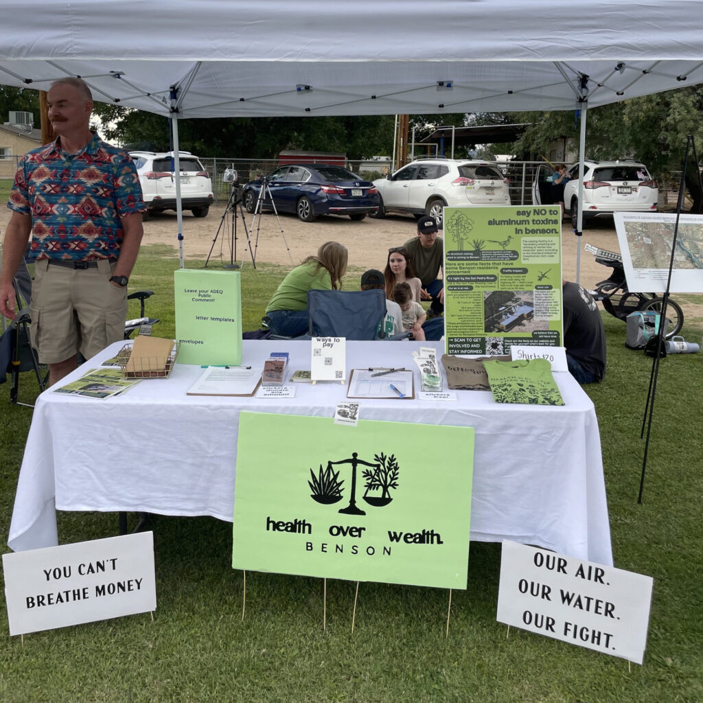 On July 19, members of Health Over Wealth Benson hosted a booth to raise awareness about their opposition to the Aluminum Dynamics plant at Pioneer Days, an annual event held in the neighboring community of St. David. Credit: Courtesy of Ashlyn Bloom