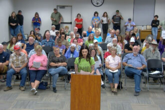 Local beef rancher Ashlyn Bloom speaks against the aluminum recycling plant proposed by Aluminum Dynamics, Inc. at a Sept. 8 Benson City Council meeting. Credit: Courtesy of Ashlyn Bloom