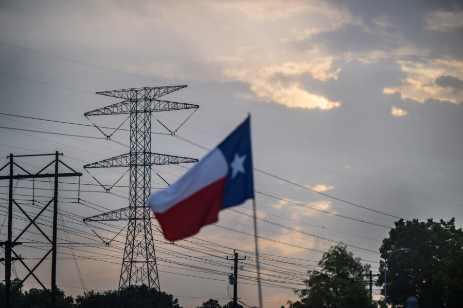 In Houston, a transmission tower in July, as ERCOT, the state's power grid, urged customers to preserve electricity. Credit: Brandon Bell/Getty Images
