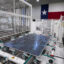 In Houston, solar panels run down the line to the next manufacturing process at Elin Energy's solar panel manufacturing facility. Credit: Brett Coomer/Houston Chronicle via Getty Images