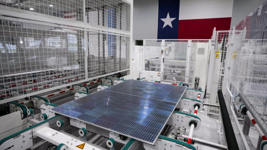 In Houston, solar panels run down the line to the next manufacturing process at Elin Energy's solar panel manufacturing facility. Credit: Brett Coomer/Houston Chronicle via Getty Images