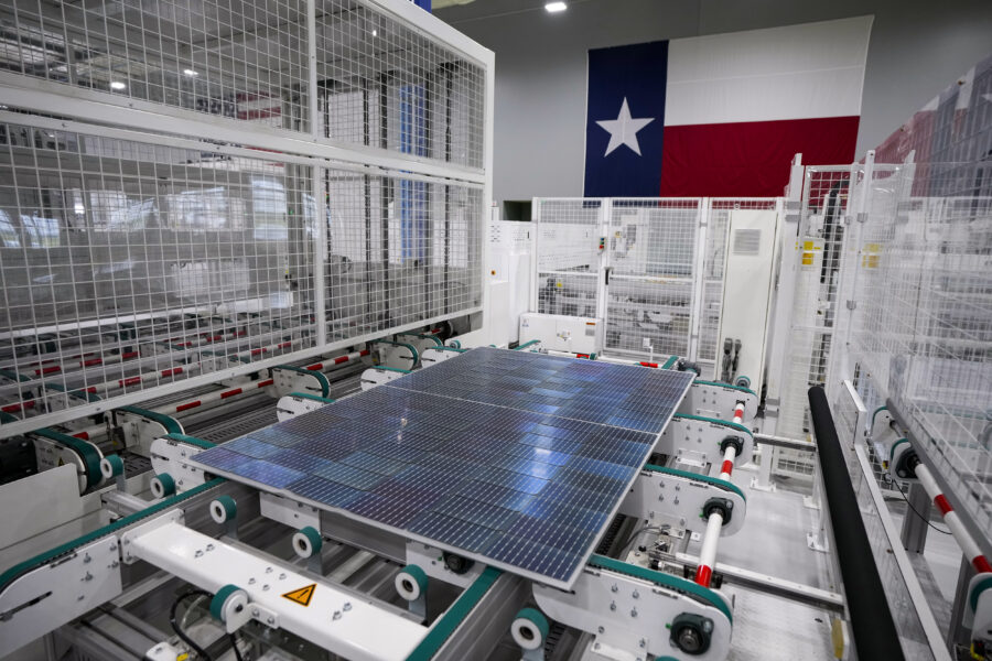 In Houston, solar panels run down the line to the next manufacturing process at Elin Energy's solar panel manufacturing facility. Credit: Brett Coomer/Houston Chronicle via Getty Images