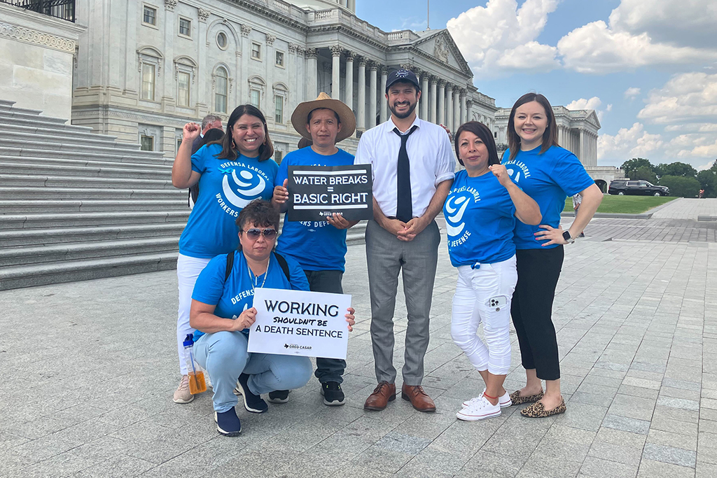 Members of the Workers Defense Project rally at the Texas Governor’s Mansion in 2023 to protest HB2127 and advocate for water breaks. Credit: Courtesy of Workers Defense Project