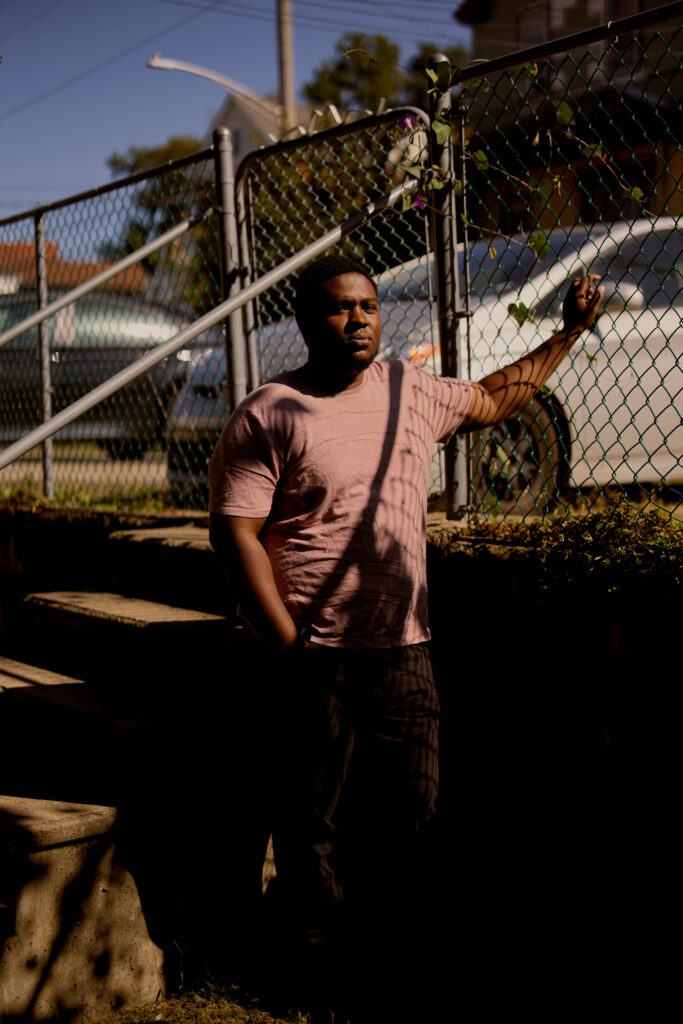 Qiyam Ansari, executive director of Valley Clean Air Now, lives near a steel plant with his cat Kiki who needs an inhaler for her asthma.