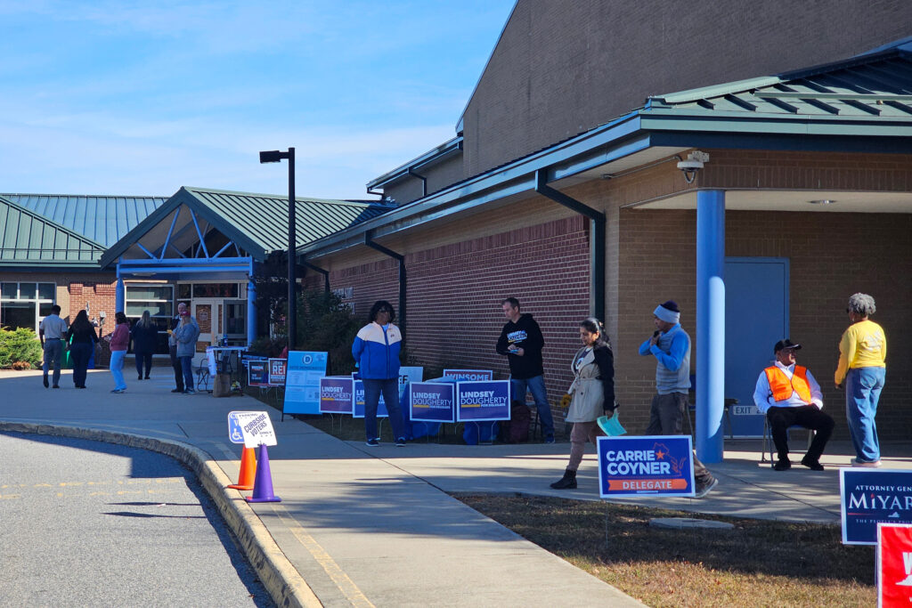 People gather at the Elizabeth Scott Elementary School polling location in Chesterfield County on Tuesday. Credit: Charles Paullin/Inside Climate News