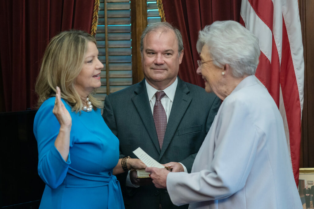 Cynthia Almond is sworn in by Gov. Kay Ivey as the president of the Alabama Public Service Commission. Credit: courtesy of Alabama Governor’s Office