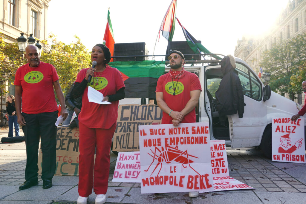 Protesters gather outside a Paris courthouse in October 2024 to support victims of chlordecone after judges dismissed a lawsuit filed 18 years ago. The case is now awaiting appeal. Credit: Mathilde Augustin/Inside Climate News