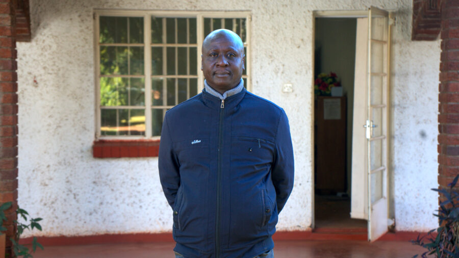 Tawanda Majoni, an investigative journalist and founder of Information for Development Trust, stands outside his office in Harare, Zimbabwe. Credit: Katie Surma/Inside Climate News