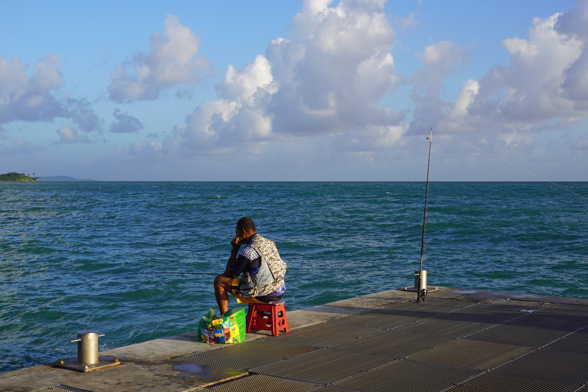 Fishing is prohibited along most of Martinique’s coast because of chlordecone contamination. In rare unpolluted areas like Le Diamant, fishing enthusiasts still gather. Credit: Mathilde Augustin/Inside Climate News